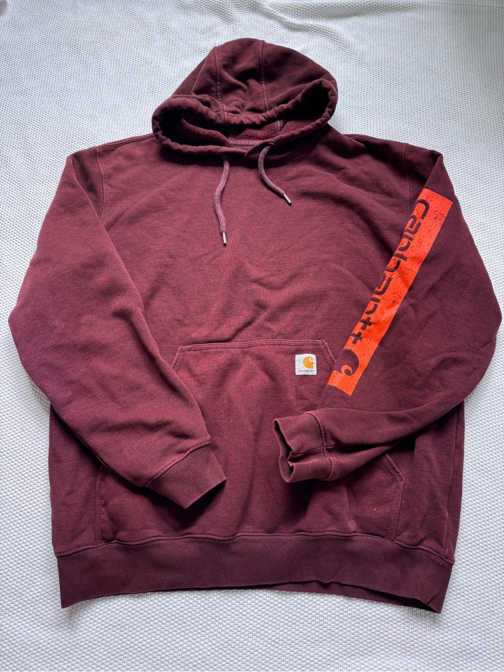 Carhartt Men’s Maroon Hooded Sweatshirt with Orange Sleeve Logo